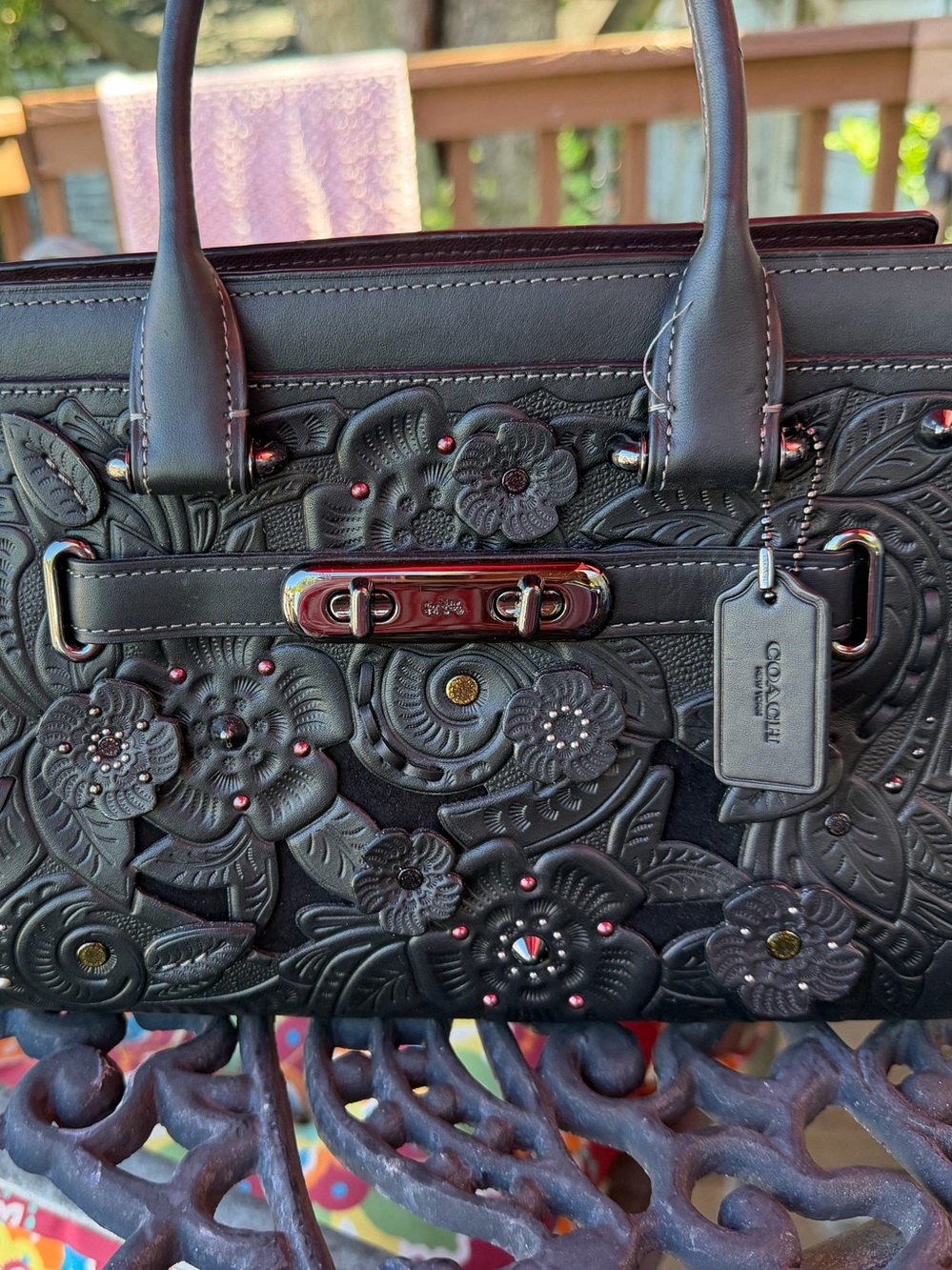 Coach Black Floral swagger Embossed Leather Satchel with Pink Accent Studs